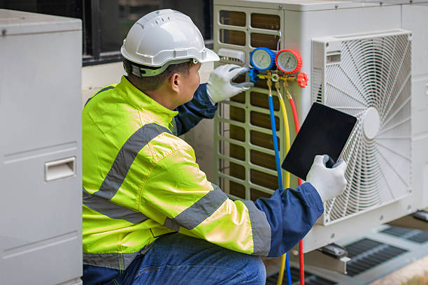 Professional Emergency Ac Repair technician working in Falls City, OR